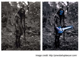 Two versions of the same photo. Both images feature a man standing outdoors in a natural, forest-like setting. The man has long dreadlocks, no shirt, and wears what seems to be a skirt or a similar garment. The photo on the left is in grayscale (black and white); the man stands still and looks towards the camera, with his arms hanging by his sides, and the background is dense with trees and foliage. The photo on the right is still grayscale, but certain elements are edited in colour. The face is now covered with blue paint or a mask, and he is holding a blue electric guitar in his hands. Adding the guitar and the face paint gives this version a much more stylized, artistic feel compared to the original. This comparison highlights a modification to the original image, which seems to involve adding modern elements to a raw or traditional photograph. The image credit points to a website (prwstartuplawyer.com), referencing legal discussions related to artistic copyright or appropriation.